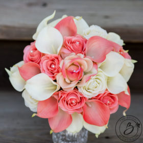 Real touch wedding bouquet with natural touch flowers, coral and ivory roses and calla lilies